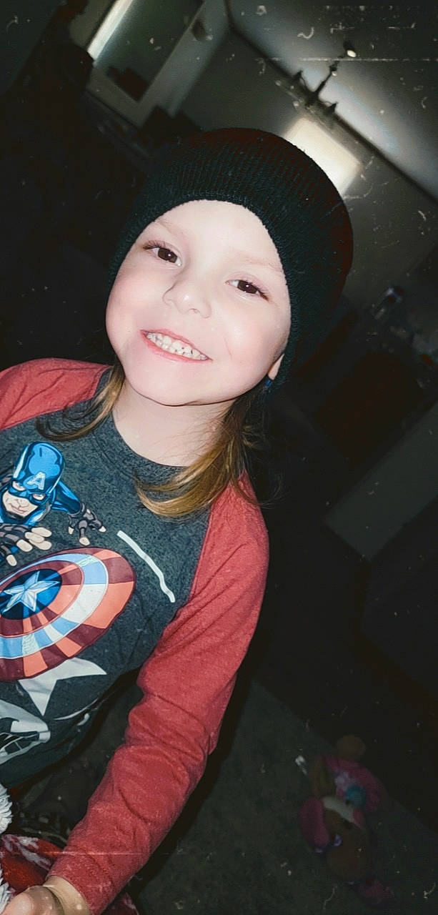 Mason is registered to the contest to win money with this photo: black_hair, cap, cool, eye, eyebrow, facial_expression, flash_photography, hairstyle, happy, hat, head, headwear, human_body, joy, lip, long_hair, mouth, outerwear, person, skin