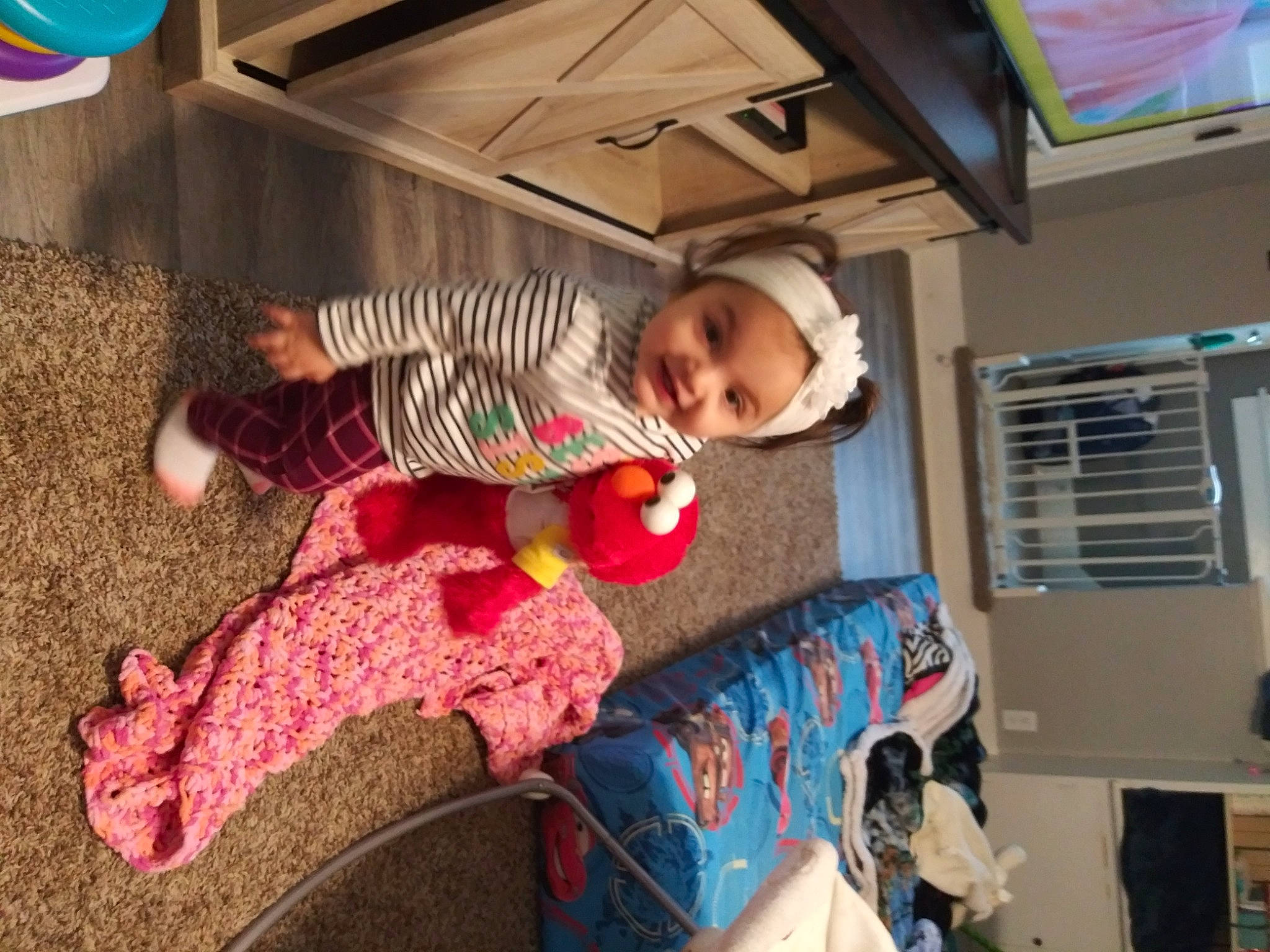 Mireyah joined the competition — help win amazing prizes! baby, baby_products, baby_toddler_clothing, baby_toys, child, comfort, floor, flooring, foot, fun, headwear, leisure, mammal, person, play, room, sitting, skin, sock, toddler