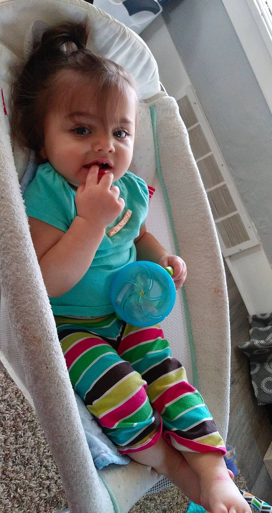 Mireyah is registered to the contest to win money with this photo: baby, baby_playing_with_toys, baby_toddler_clothing, cheek, comfort, drinkware, face, finger, hairstyle, hand, happy, human_leg, nail, person, pink, skin, sleeve, sock, thigh, thumb