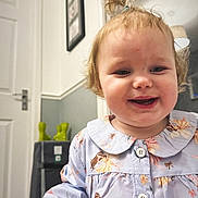 Harper joined the competition — help win amazing prizes! toddler, child, smiling, indoor, dress, pony_tail, fairy_print, buttoned_shirt, face, person, happy, home, door, frame, toy, boots, carpet, curly_hair, young_child, cute