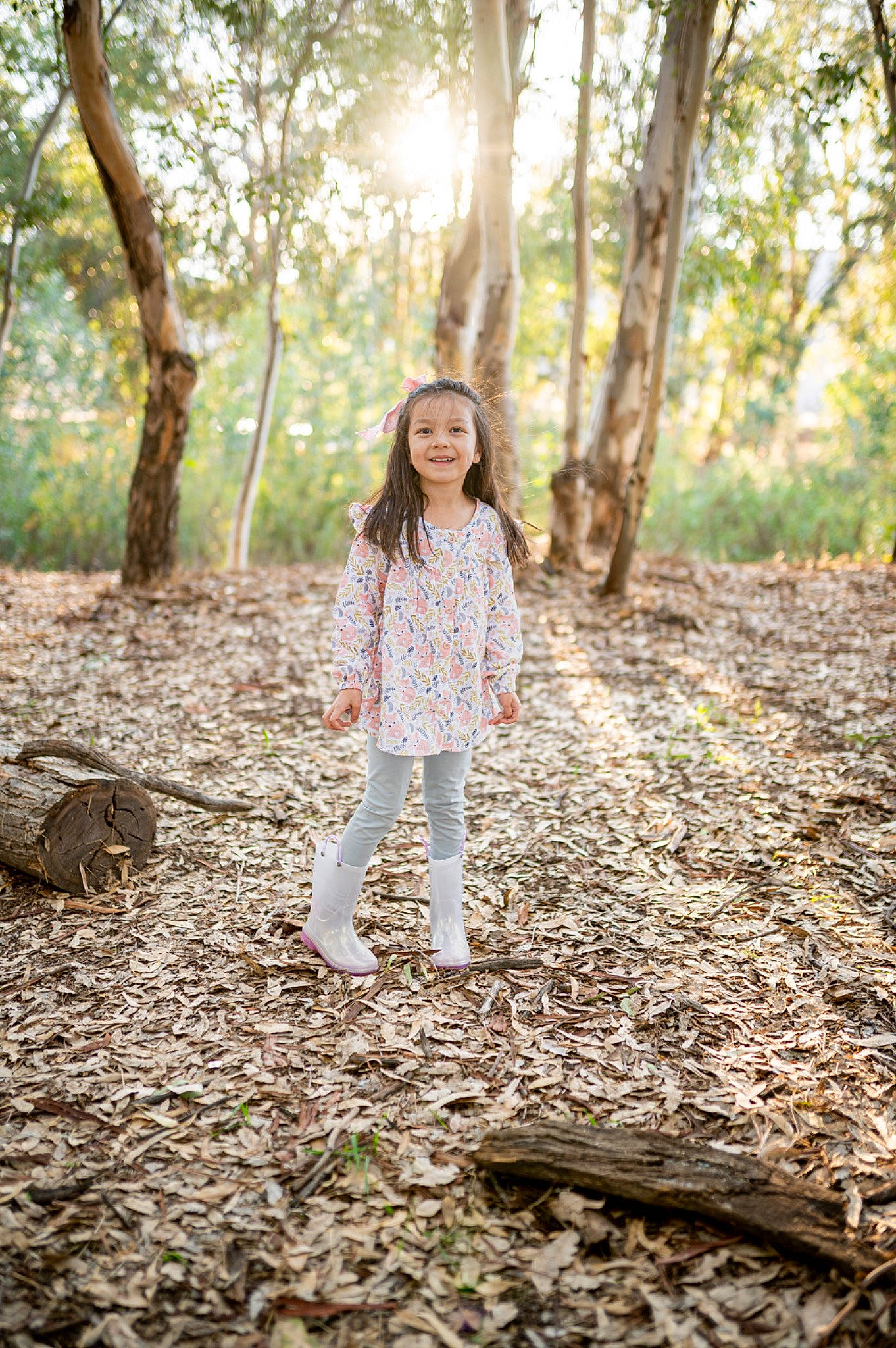 Brighton is registered to the contest to win money with this photo: branch, brown_hair, deciduous, fawn, forest, grass, happy, joy, leisure, natural_landscape, pattern, people_in_nature, person, plant, recreation, soil, tree, trunk, twig, wilderness