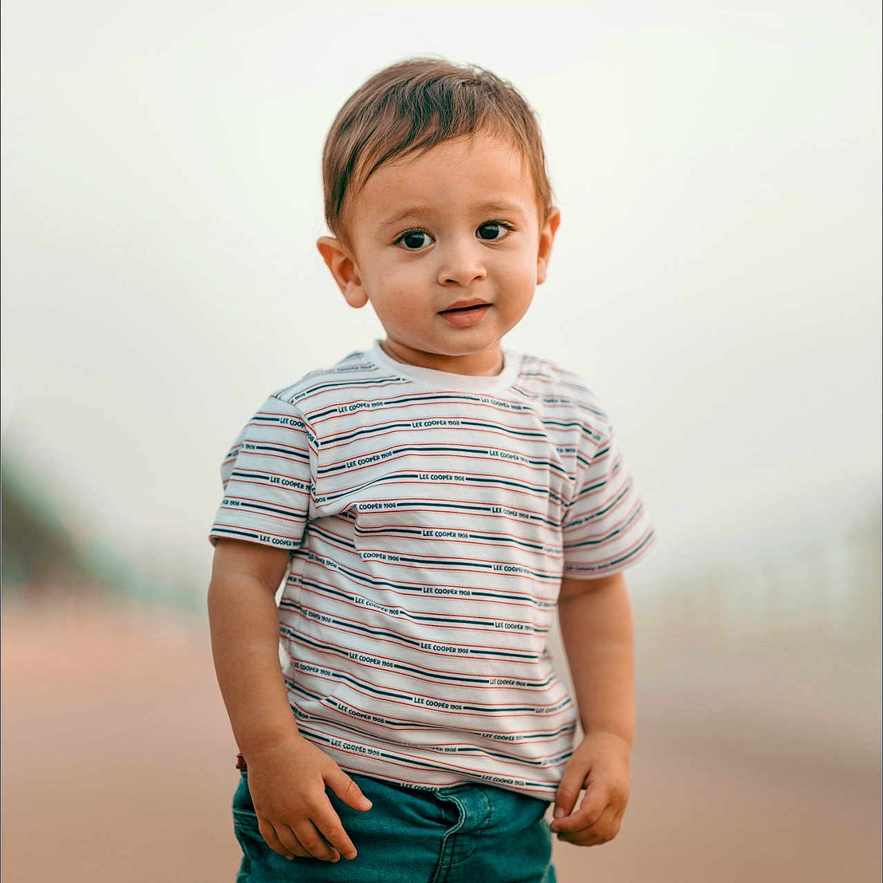 Ca Miyah joined the competition — help win amazing prizes! background_blur, boy, casual_clothing, child, curious, cute, daylight, fashion, innocent, jeans, outdoor, person, portrait, short_hair, skin, smile, standing, striped_tshirt, toddler, young_child
