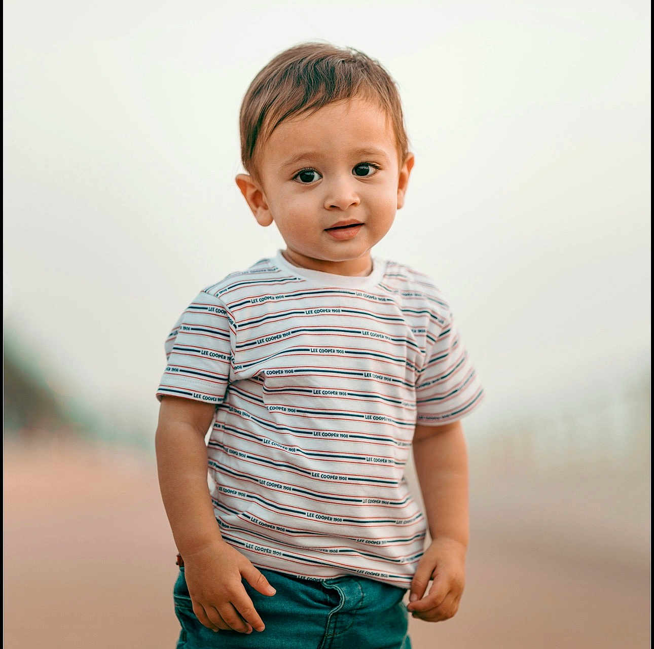 Ca Miyah joined the competition — help win amazing prizes! toddler, child, boy, striped_tshirt, jeans, outdoor, portrait, curious, standing, short_hair, casual_clothing, young_child, cute, innocent, daylight, fashion, person, smile, background_blur, skin