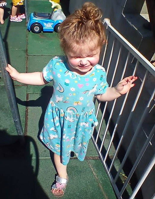 Felicity is registered to the contest to win money with this photo: baby, baby_products, baby_toddler_clothing, blue, child, electric_blue, fun, hairstyle, happy, joint, leisure, motor_vehicle, person, sandal, skin, summer, t_shirt, tire, toddler, vehicle_door