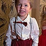 Théo a rejoint le concours — aidez-le/la à gagner de superbes lots ! background, bow_tie, boy, child, cute, decor, event, face, fashion, formal_wear, happy, indoor, maroon_pants, party, person, portrait, smiling, suspenders, white_shirt, young