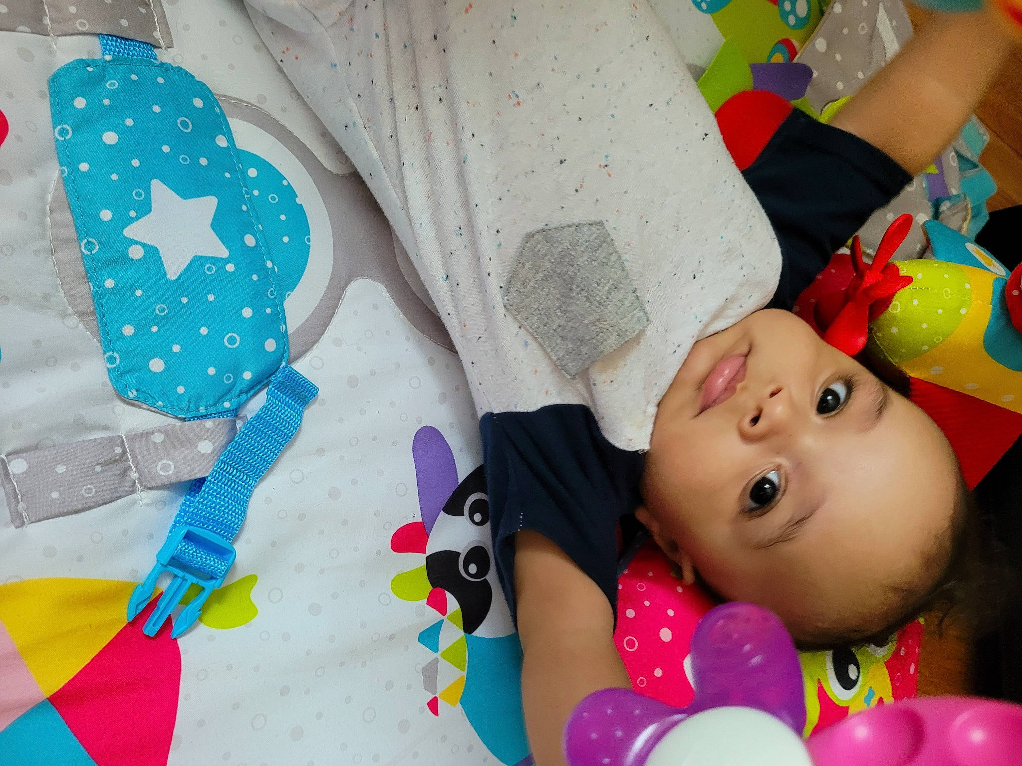 Emmanuel is registered to the contest to win money with this photo: baby, baby_playing_with_toys, baby_products, baby_toddler_clothing, baby_toys, cheek, child, fun, happy, linens, pattern, person, pink, play, product, sleeve, stuffed_toy, textile, toddler, toy