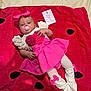 Mia participe au concours pour gagner de l'argent avec cette photo : baby, infant, pink_dress, headband, pacifier, blanket, red_blanket, white_clothing, card, milestone_card, indoor, cute, child, laying_down, baby_bows, soft_texture, portrait, young_child, three_months, celebration