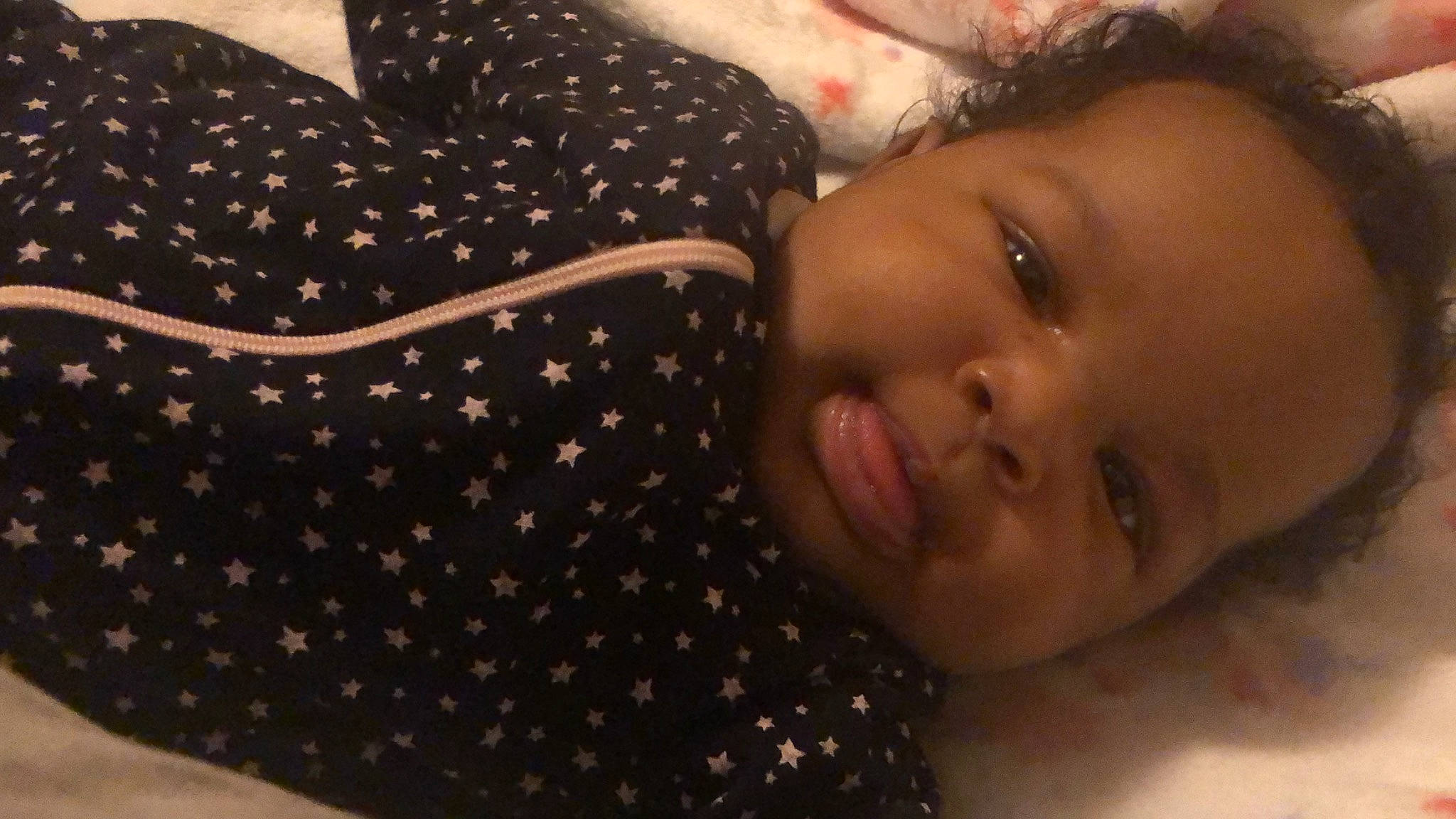 Londyn is registered to the contest to win money with this photo: baby, bedtime, black_hair, cheek, child, face, head, lip, nose, person, skin, toddler