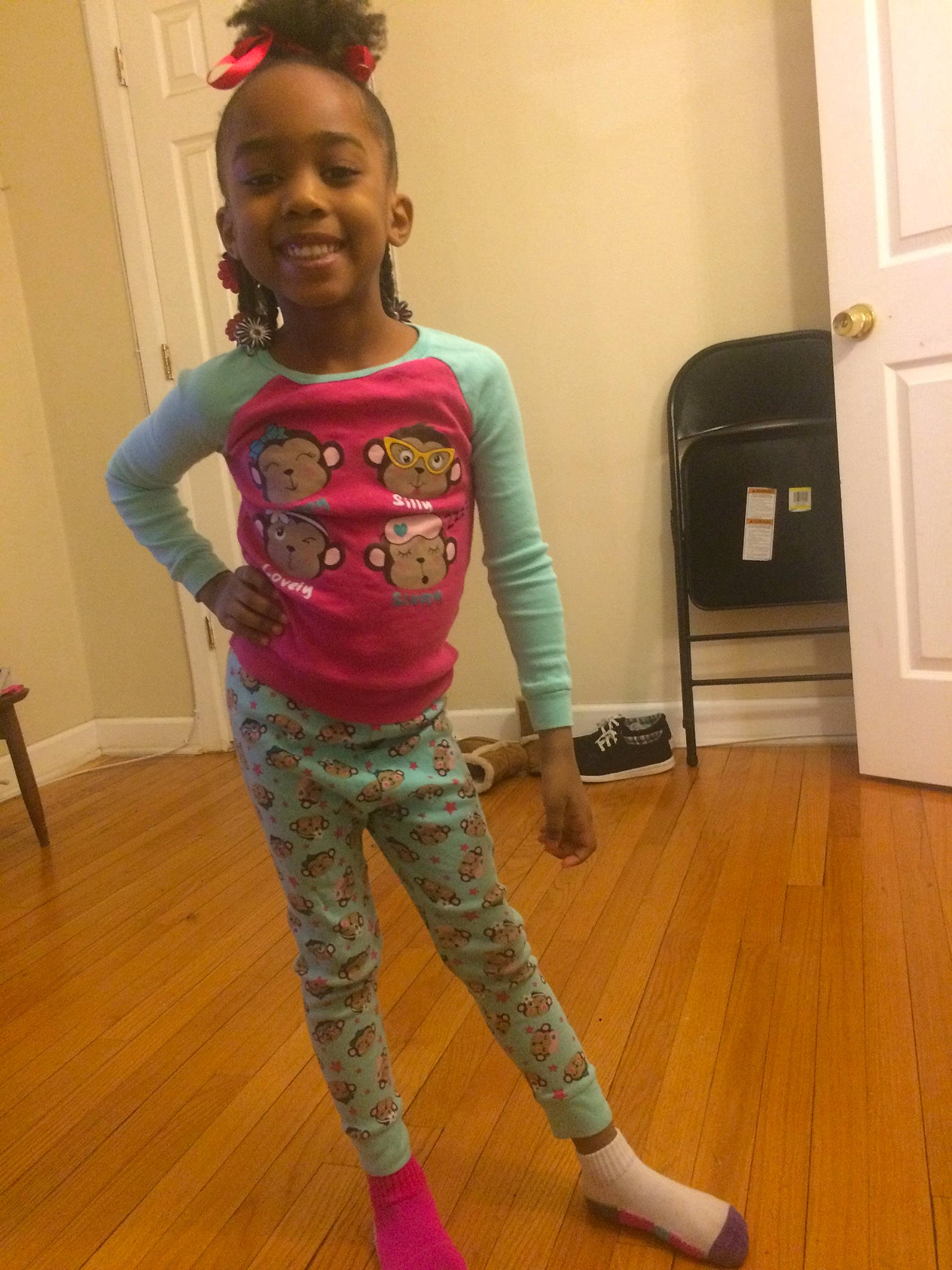 Arie is registered to the contest to win money with this photo: child, clothing, flooring, footwear, jeans, joint, joy, knee, leggings, pajamas, person, pink, shoe, shoulder, sleeve, sportswear, standing, t_shirt, toddler, trousers