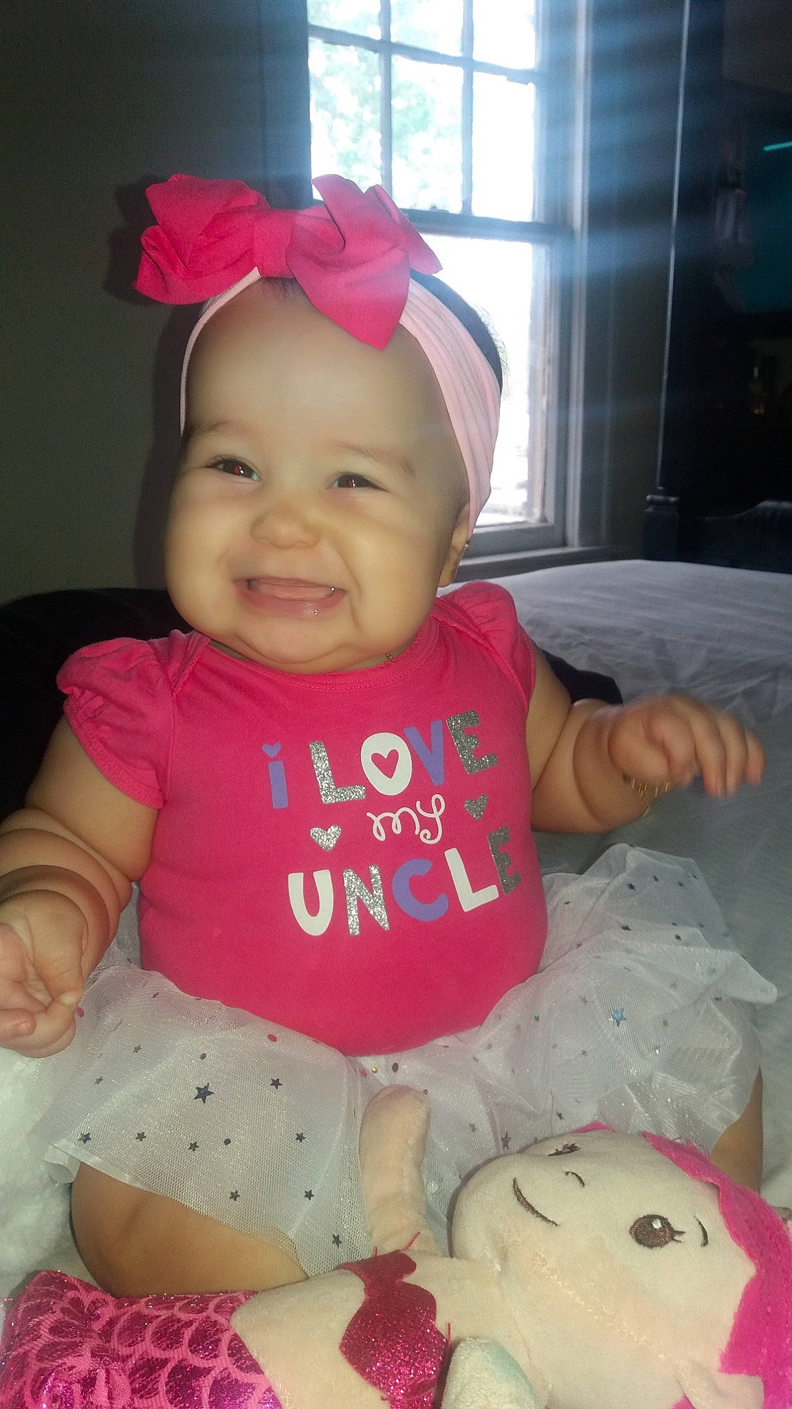 Anayiah Rose is registered to the contest to win money with this photo: baby, baby_toddler_clothing, cheek, child, hair_accessory, headgear, joy, person, pink, skin, smile, toddler