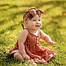 baby, child, girl, grass, outdoor, sunlight, dress, headband, bow, smiling, sitting, nature, greenery, flower, cute, portrait, happy, summer, infant, skin