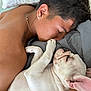 man, dog, french_bulldog, puppy, sleeping, bed, pillow, tattoo, earring, necklace, resting, closeup, human, pet, indoor, cute, animal, friendship, relaxation, affection