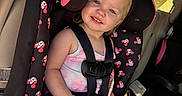Bayleigh joined the competition — help win amazing prizes! child, toddler, girl, smiling, car_seat, car, passenger, seatbelt, harness, minnie_mouse, disney, pink, pastel, bow, sippy_cup, toy, sunlight, vehicle_interior, portrait, road_trip