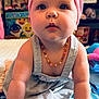 Bayleigh is registered to the contest to win money with this photo: baby, bow, child, child_room, closeup, colorful, crawling, cute, expression, face, grey_dress, hand, headband, indoor, infant, necklace, person, play, toy, young_child