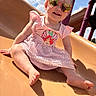 Bayleigh joined the competition — help win amazing prizes! child, toddler, slide, playground, sunglasses, pink_dress, sunny_day, smile, outdoor, happy, barefoot, summer, fun, play, reflection, blue_sky, clouds, legs, face, hairclip