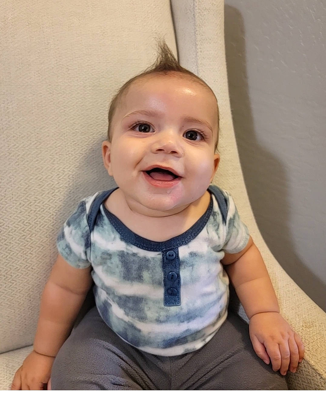 Kyren is registered to the contest to win money with this photo: baby, baby_toddler_clothing, cheek, clothing, collar, eye, eyelash, finger, flash_photography, gesture, happy, human_body, iris, mouth, nose, person, skin, sleeve, smile, t_shirt