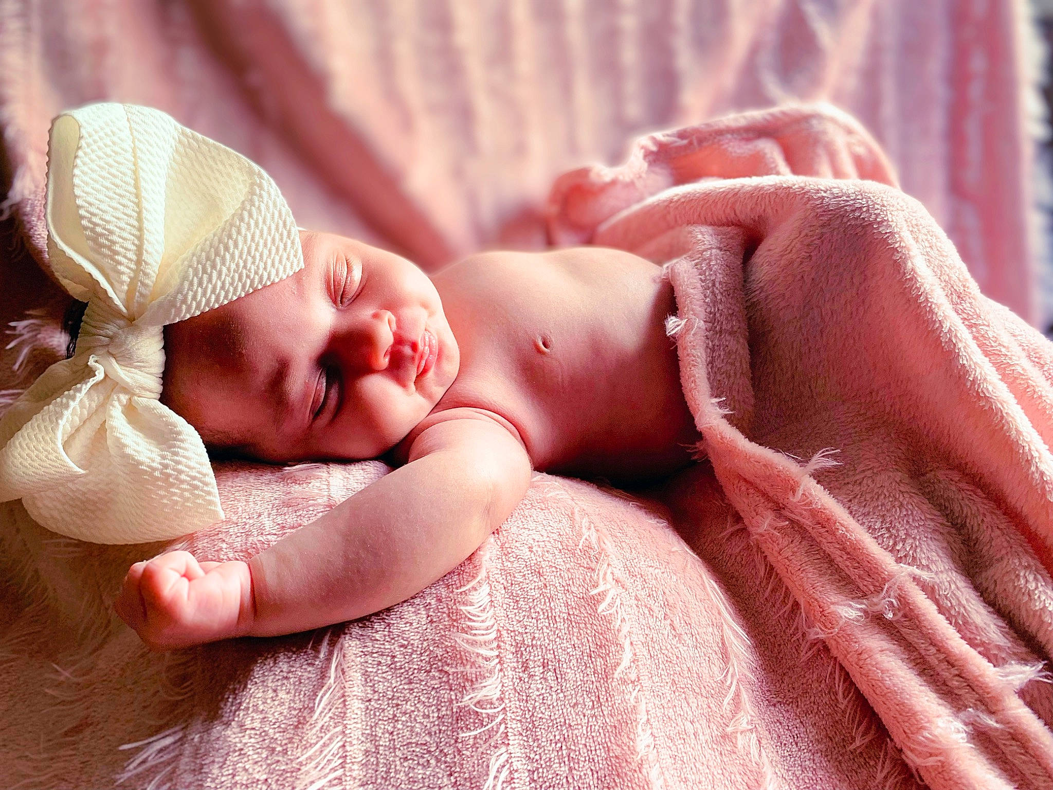 Amelia is registered to the contest to win money with this photo: baby, baby_sleeping, baby_toddler_clothing, child, close_up, comfort, fashion_accessory, finger, grass, hand, happy, hat, headpiece, headwear, linens, lip, person, pink, skin, sun_hat