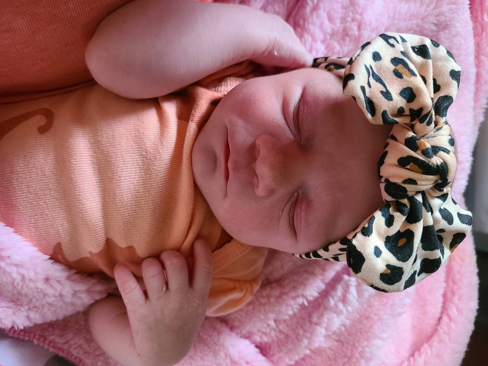 Jaylin joined the competition — help win amazing prizes! arm, baby, baby_products, baby_sleeping, baby_toddler_clothing, child, comfort, eyelash, fashion_accessory, finger, hand, headwear, linens, nail, pattern, person, pink, skin, sleeve, textile