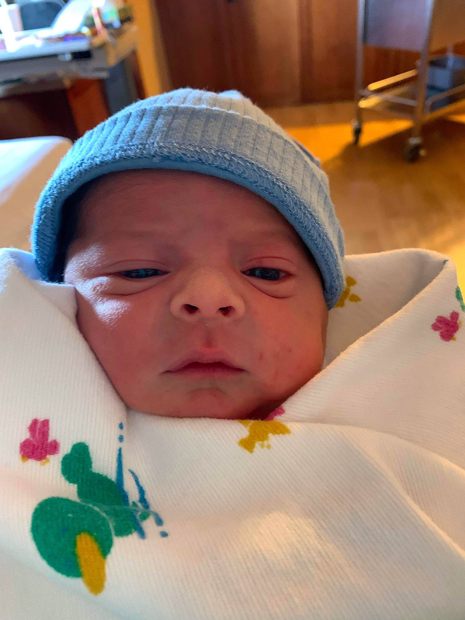 Dakota is registered to the contest to win money with this photo: baby, baby_products, baby_toddler_clothing, cheek, child, chin, comfort, eyebrow, eyelash, finger, fun, happy, headwear, linens, lip, mouth, nose, person, room, skin