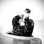 Lou participe au concours pour gagner de l'argent avec cette photo : baby, black_and_white, bottle, child, cozy_clothing, cute, drinking, face, hands, high_chair, hydration, indoor, minimalist, reflection, seat, space_theme, sweater, table, toddler, young_child