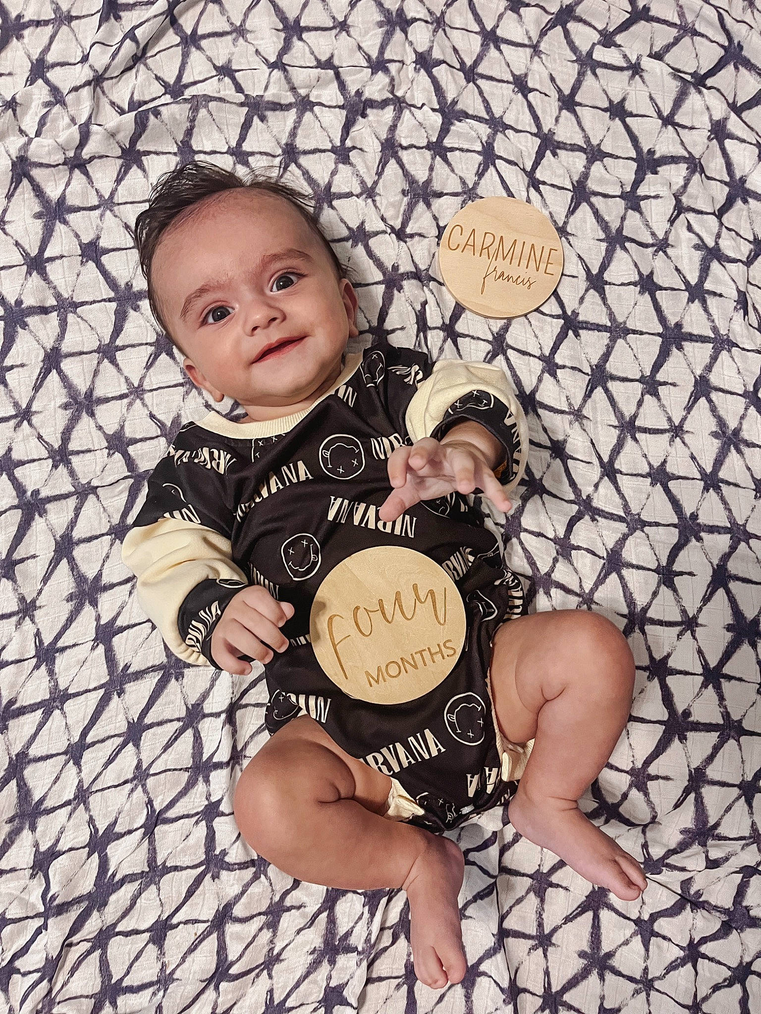 Carmine is registered to the contest to win money with this photo: art, baby, baby_toddler_clothing, child, circle, font, foot, fun, gesture, happy, illustration, joy, mesh, metal, pattern, person, play, smile, t_shirt, thigh