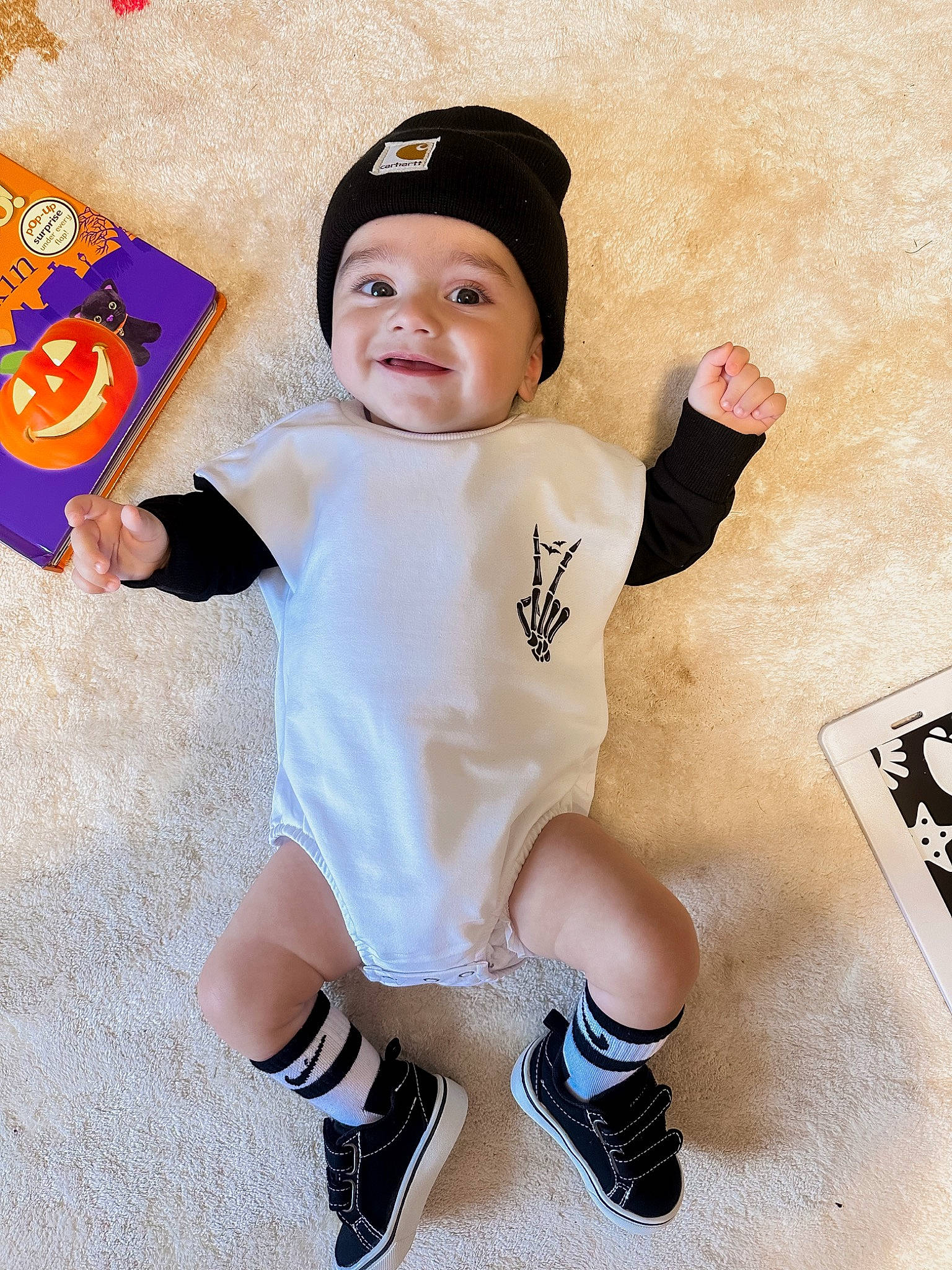 Carmine is registered to the contest to win money with this photo: baby_toddler_clothing, cap, cool, finger, font, gesture, happy, headwear, human_leg, joy, knee, person, roller_skates, shoe, shorts, sleeve, smile, sneakers, sportswear, t_shirt