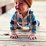 Khoen joined the competition — help win amazing prizes! baby, child, crawling, beanie, hat, blue_jacket, plaid, wooden_deck, outdoor, natural_light, cute, smile, hands, face, infant, young, casual_clothing, portrait, warm_clothing, happy