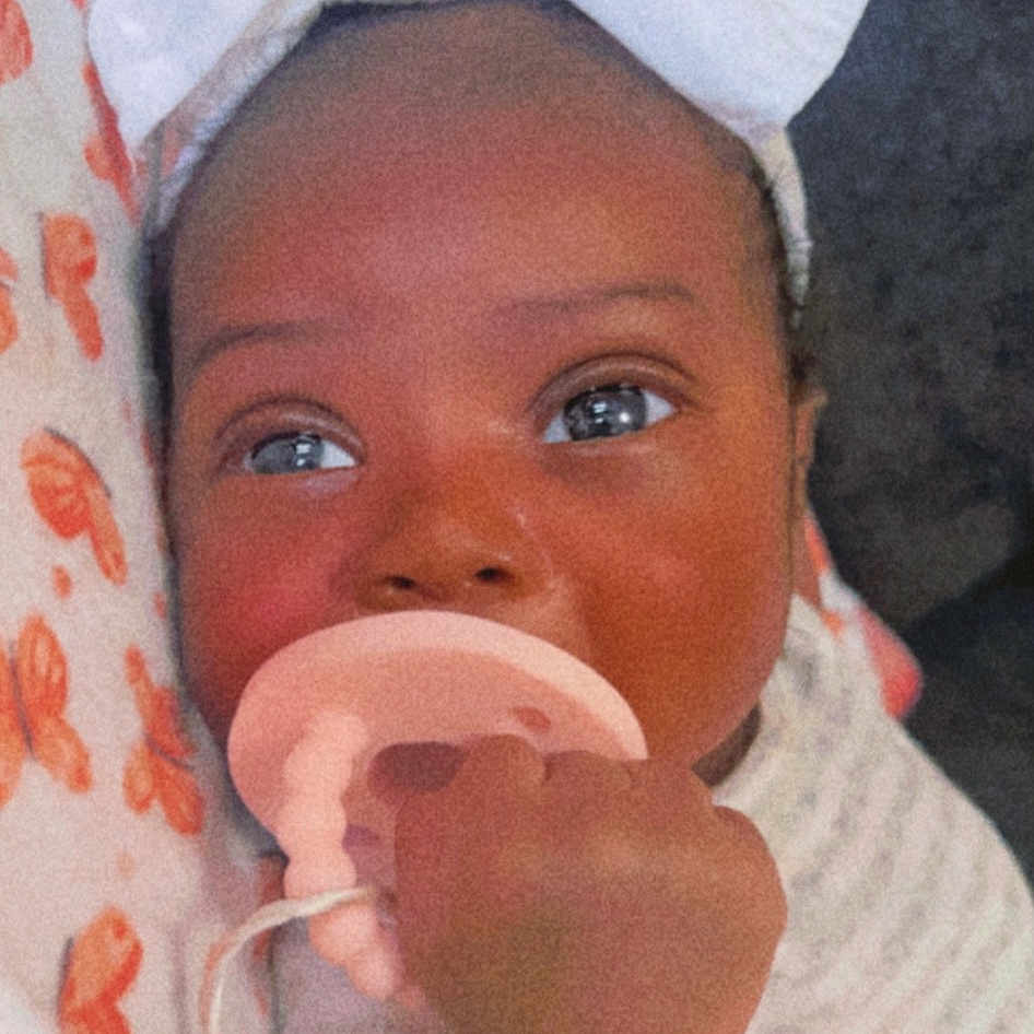 Royale is registered to the contest to win money with this photo: baby, baby_products, baby_toddler_clothing, cheek, child, drinkware, ear, eye, eyelash, happy, hat, iris, jaw, lip, mouth, nail, nose, skin, thumb, toddler