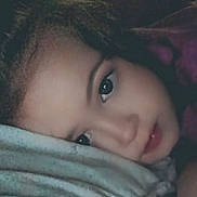 Macelynn is registered to the contest to win money with this photo: calm, casual, child, close_up, comfort, cozy, expression, face, hair, head, indoors, lying_down, person, pillow, portrait, resting, skin, sleepy, soft_lighting, young