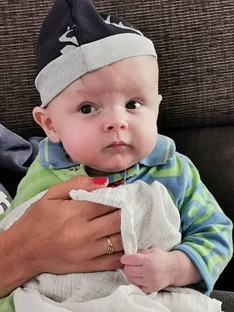 Terry joined the competition — help win amazing prizes! baby, cheek, child, hat, headgear, headwear, person, toddler