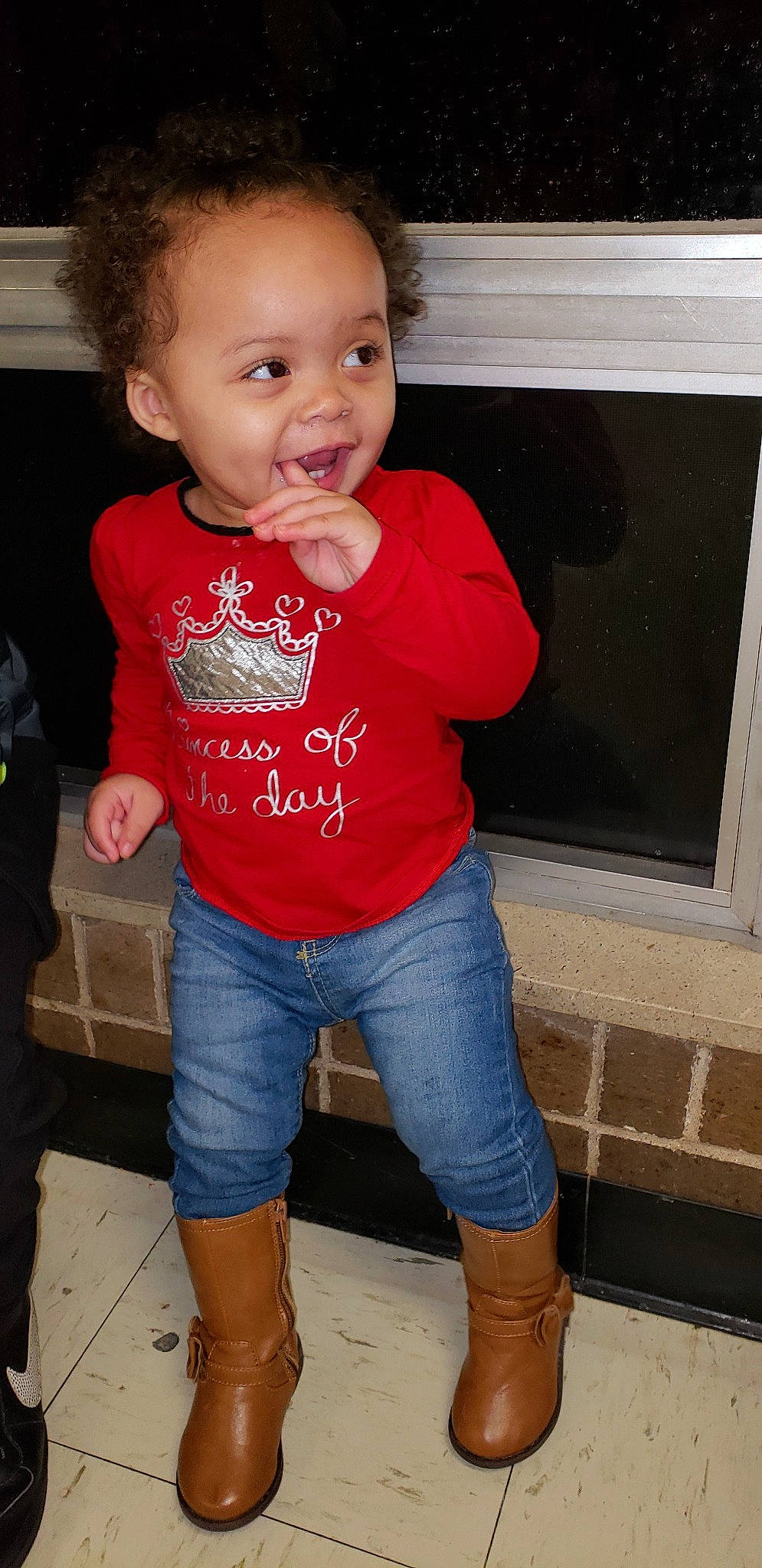 Aminah is registered to the contest to win money with this photo: arm, cheek, child, denim, jeans, person, smile, standing, t_shirt, toddler