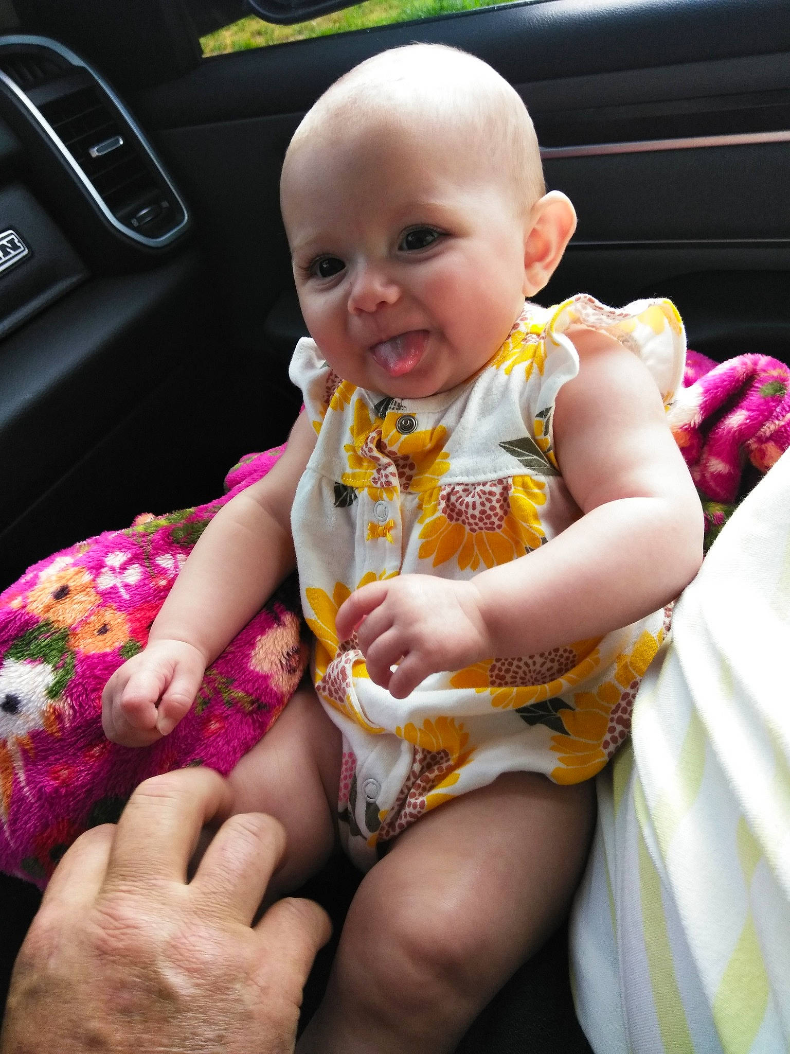 Aniya joined the competition — help win amazing prizes! baby, baby_toddler_clothing, cheek, face, facial_expression, finger, fun, grass, hand, happy, human_body, iris, lap, mouth, person, pink, product, skin, thigh, thumb