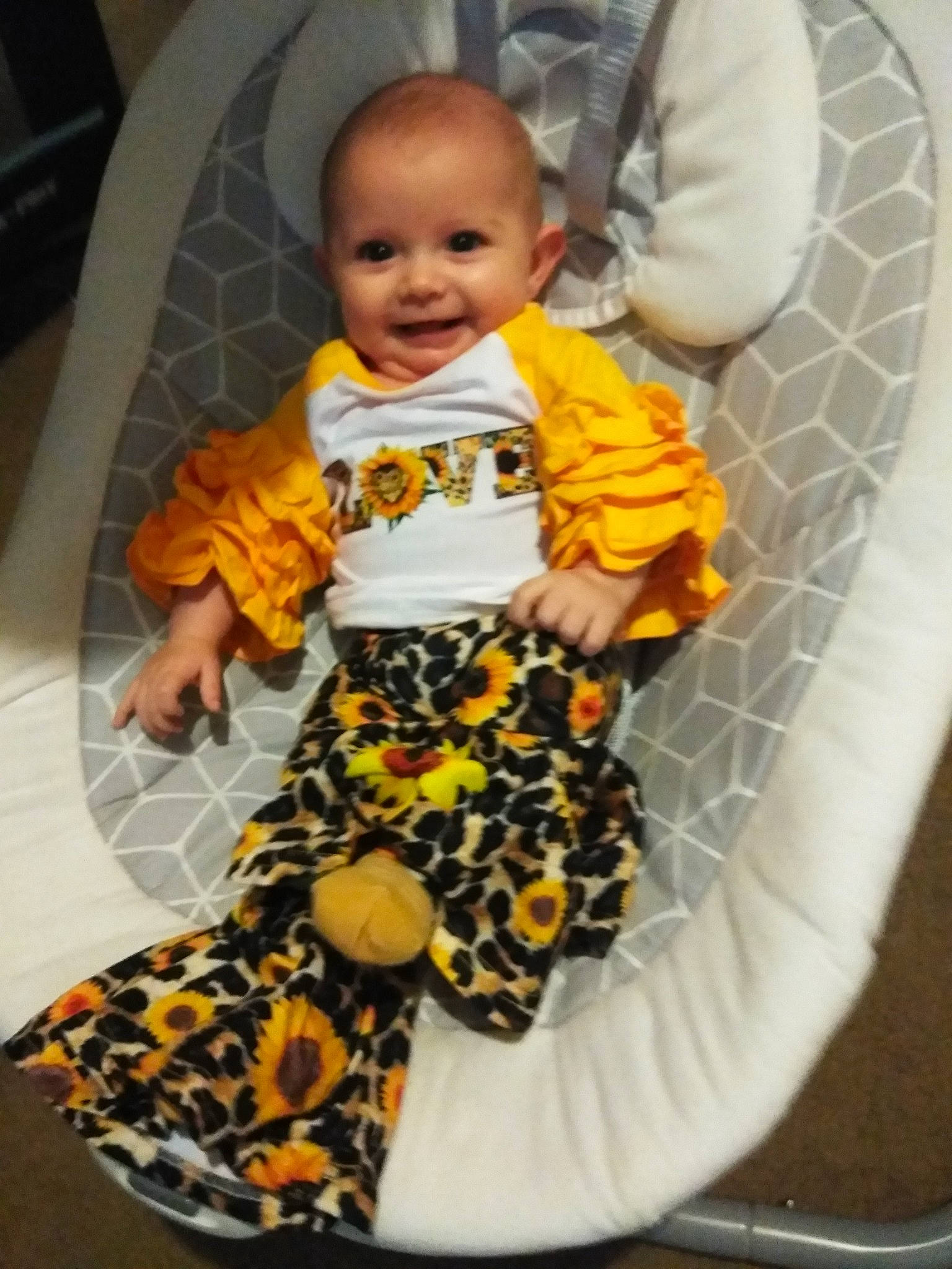 Aniya is registered to the contest to win money with this photo: baby, baby_products, baby_safety, baby_toddler_clothing, chair, child, circle, comfort, flooring, fun, happy, joy, pattern, person, product, room, sitting, sleeve, smile, t_shirt