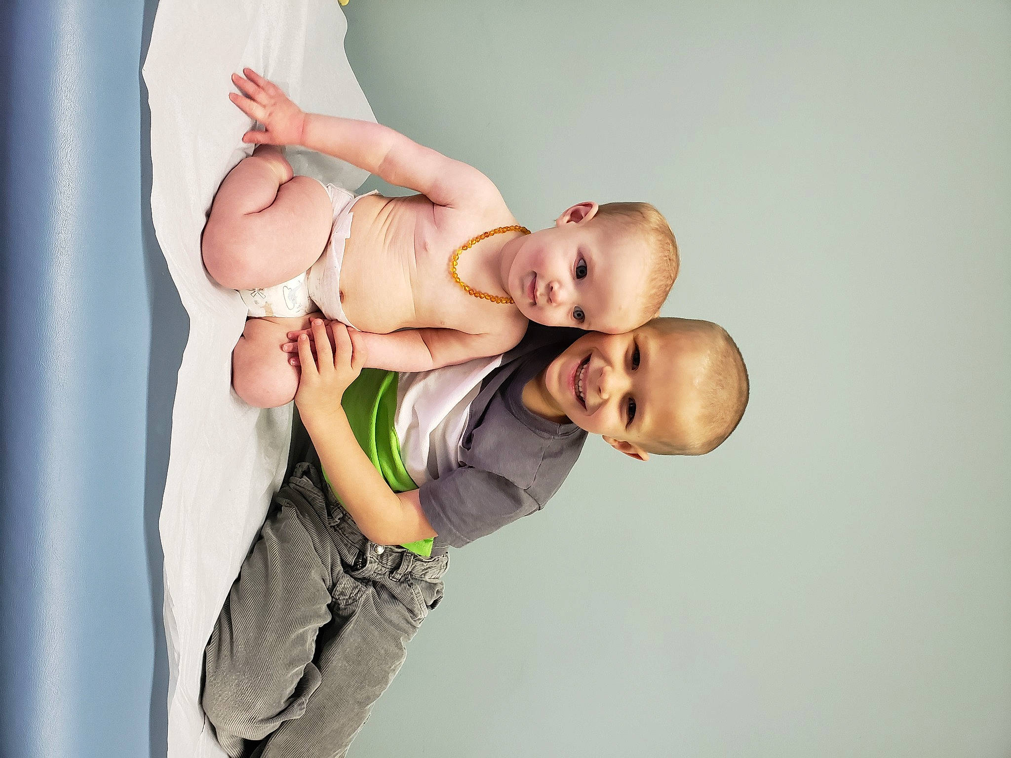 Madison is registered to the contest to win money with this photo: arm, baby, cheek, child, elbow, gesture, hand, happy, joint, joy, leg, muscle, person, photography, shoulder, skin, toddler, yellow