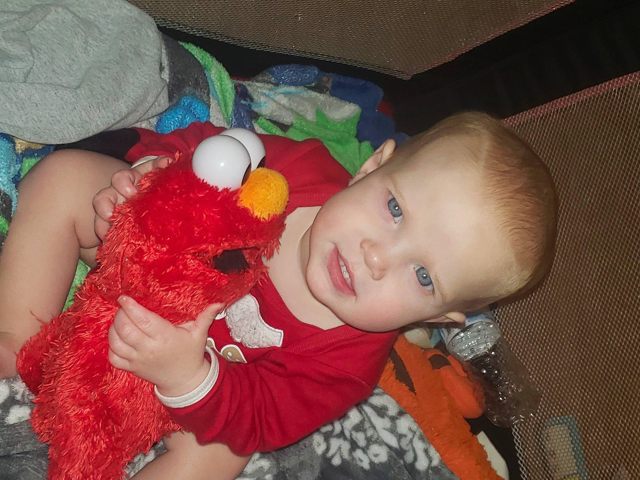 Madison is registered to the contest to win money with this photo: baby, baby_products, cheek, child, ear, eye, head, iris, mouth, nose, person, play, product, red, skin, smile, stuffed_toy, toddler