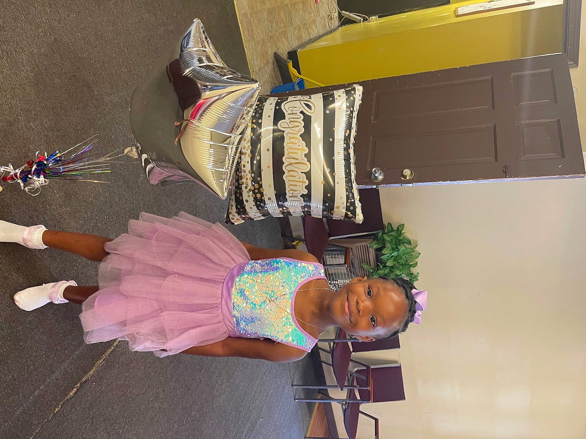 Jakijah is registered to the contest to win money with this photo: event, fun, joy, person, room, snapshot, visual_arts, wrist