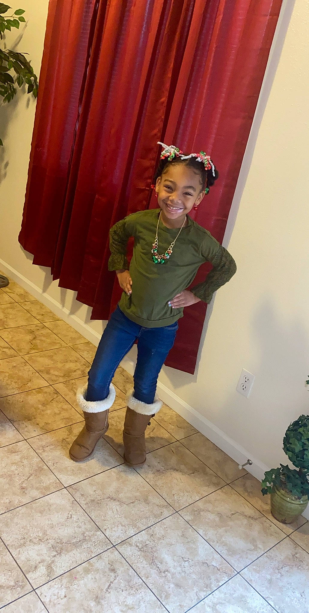 Paityn joined the competition — help win amazing prizes! child, costume, door, green, jeans, joy, outerwear, person, shoe, standing, trousers