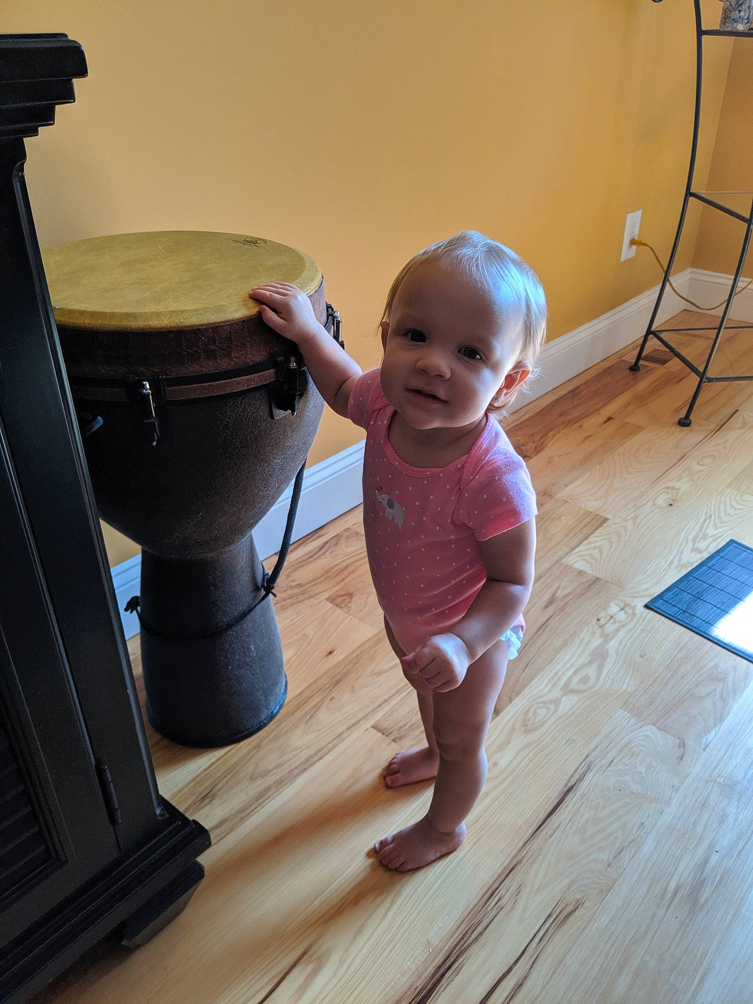 Camillia joined the competition — help win amazing prizes! baby, child, floor, flooring, hardwood, leg, person, shoulder, sitting, standing, toddler, wood, wood_flooring