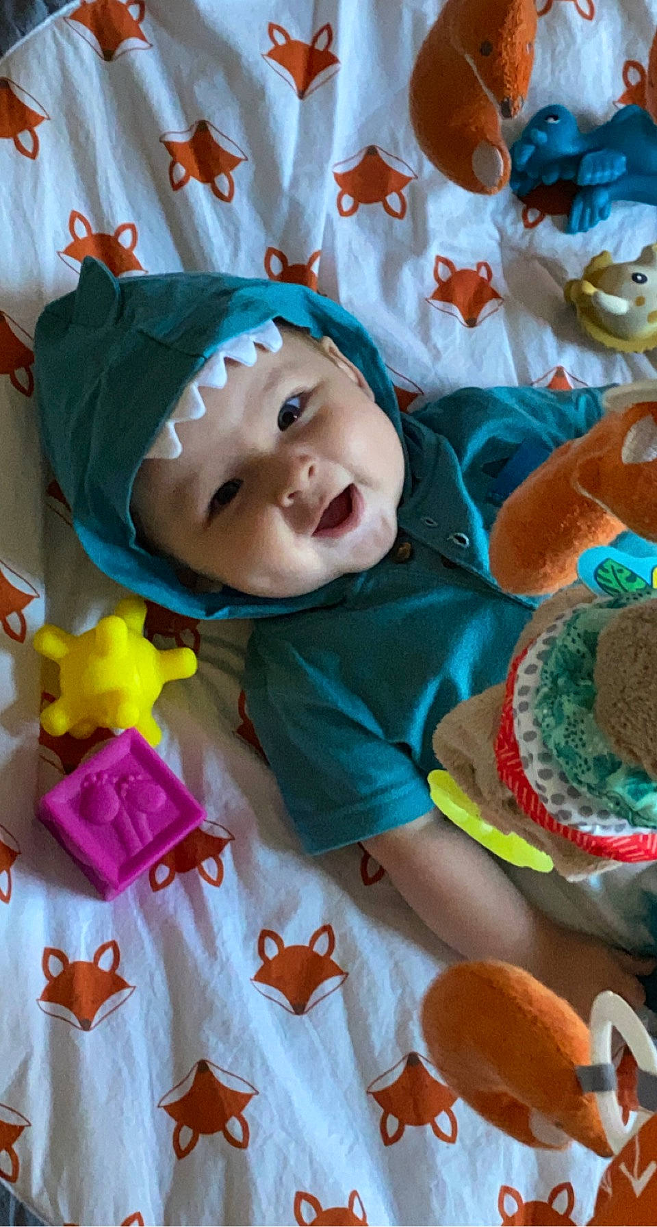 Grayson is registered to the contest to win money with this photo: baby, baby_products, baby_toddler_clothing, cheek, child, event, fun, happy, headwear, holiday, laugh, linens, pattern, person, pink, product, room, smile, sweetness, textile