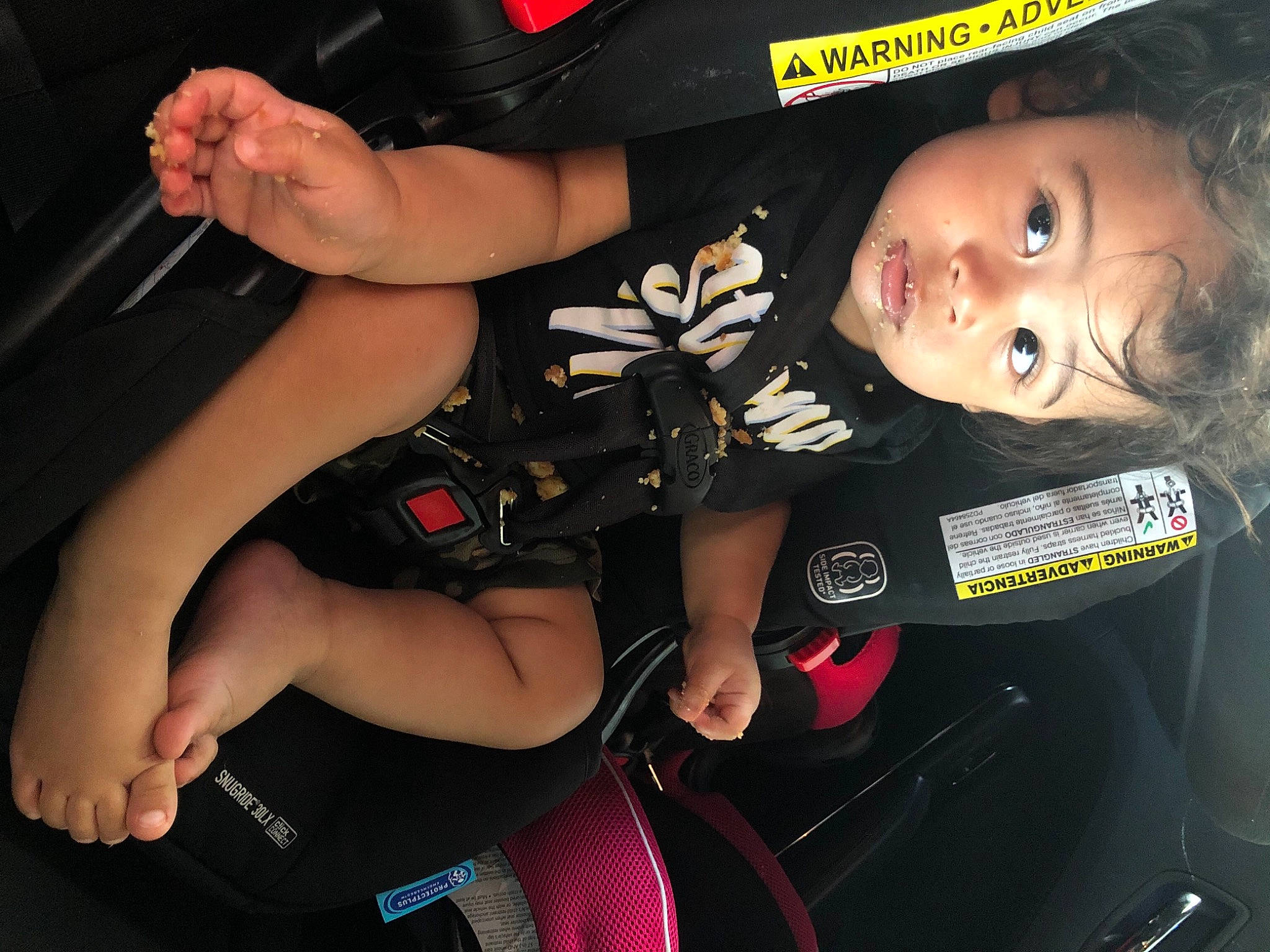 Ryland joined the competition — help win amazing prizes! auto_part, baby, black_hair, car_seat, carmine, elbow, finger, flash_photography, fun, gesture, hand, human_leg, luxury_vehicle, mouth, nail, person, personal_protective_equipment, thigh, thumb, toddler