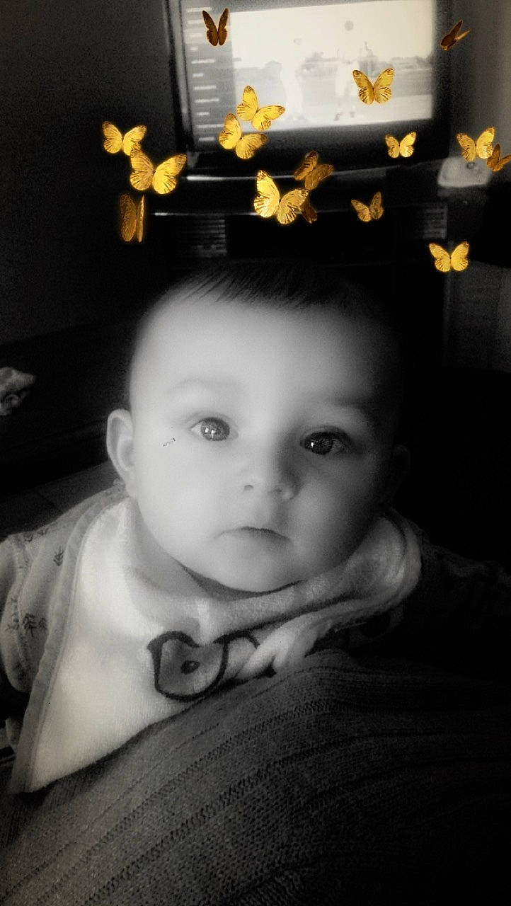 Lylian participe au concours pour gagner de l'argent avec cette photo : baby, baby_toddler_clothing, black_hair, cheek, child, chin, cool, ear, eyebrow, eyelash, flash_photography, forehead, iris, lip, person, portrait, portrait_photography, sweater, temple, toddler