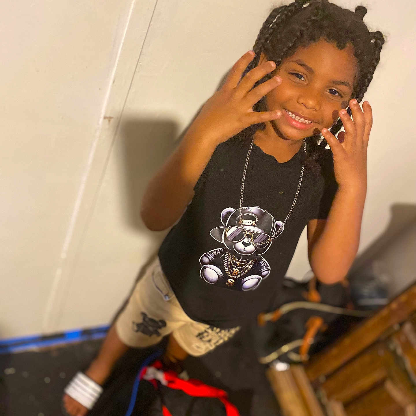 Tyjhai joined the competition — help win amazing prizes! accessories, braid, child, clothing, curlyhair, dimples, face, female, girl, hair, happy, head, jewelry, locket, necklace, pendant, person, sitting, sleeve, smile