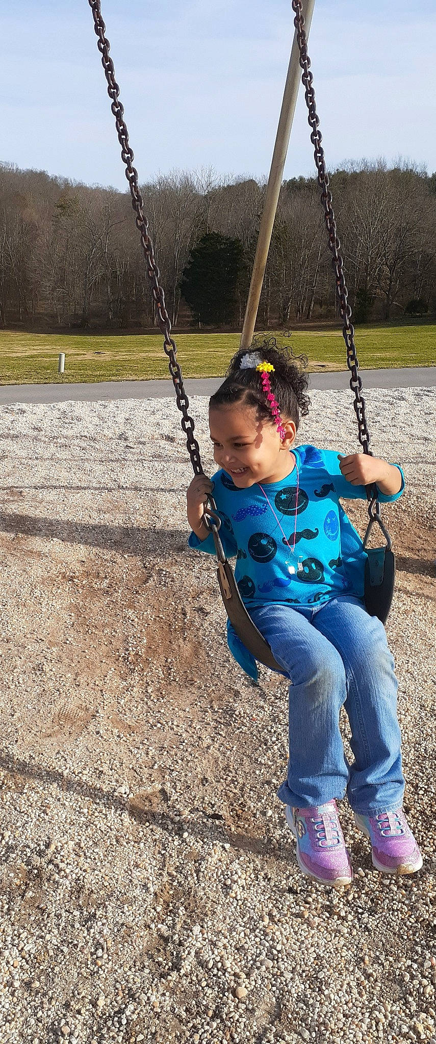Jaylah is registered to the contest to win money with this photo: child, fun, outdoor_play_equipment, person, play, playground, public_space, recreation, swing
