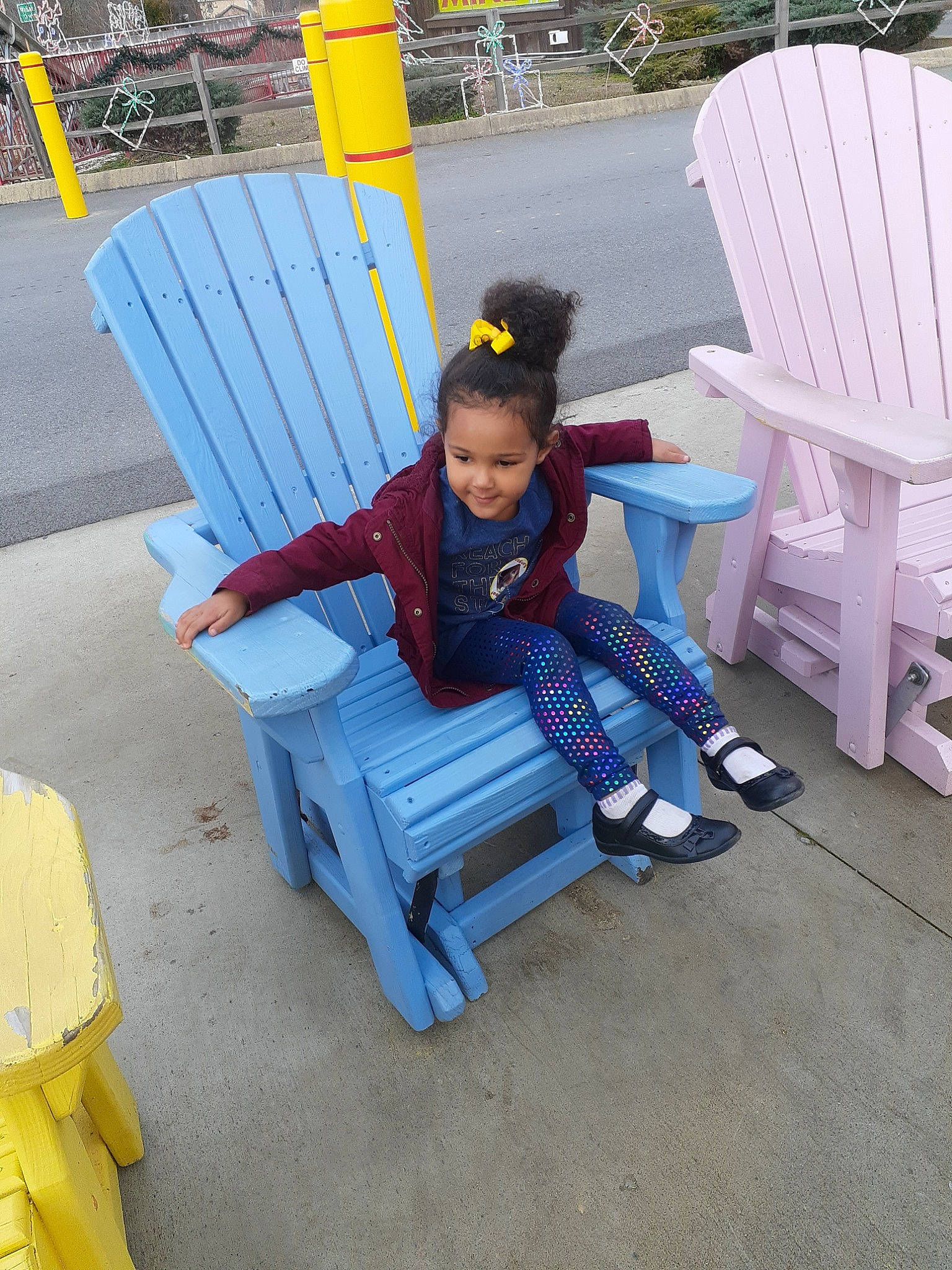 Nevaeh is registered to the contest to win money with this photo: chair, child, furniture, joy, leisure, outdoor_furniture, person, sitting, toddler, vacation