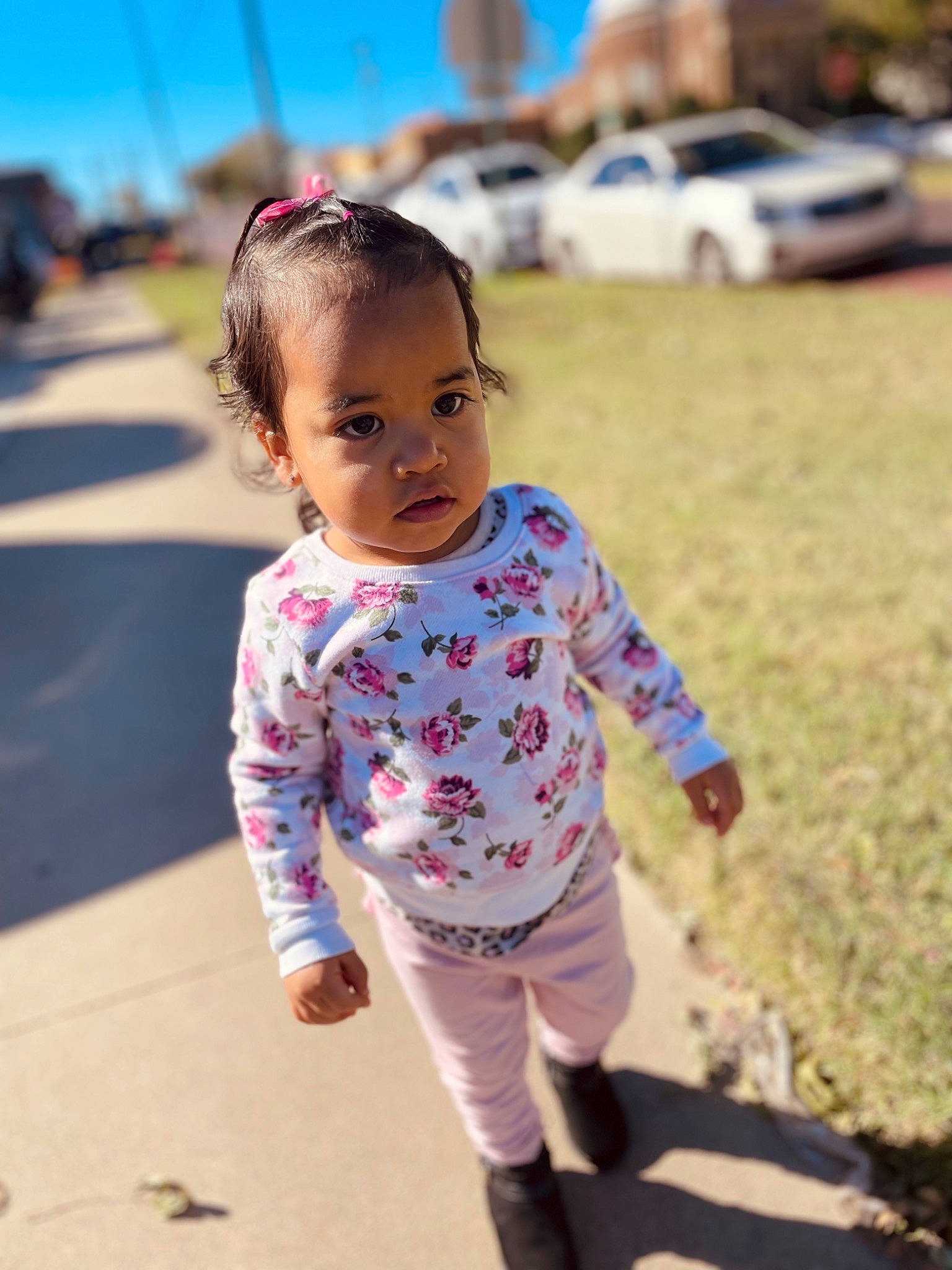 Malayah is registered to the contest to win money with this photo: baby_toddler_clothing, blond, child, city, eye, fun, grass, hair, happy, leisure, magenta, people_in_nature, person, recreation, sky, sleeve, street_fashion, summer, t_shirt, toddler