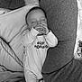 Alvarro participe au concours pour gagner de l'argent avec cette photo : baby, black_and_white, blanket, child, clothing, comfort, cozy, cushion, cute, face, hands, indoor, infant, monochrome, onesie, peaceful, pillow, resting, sleeping, soft_texture