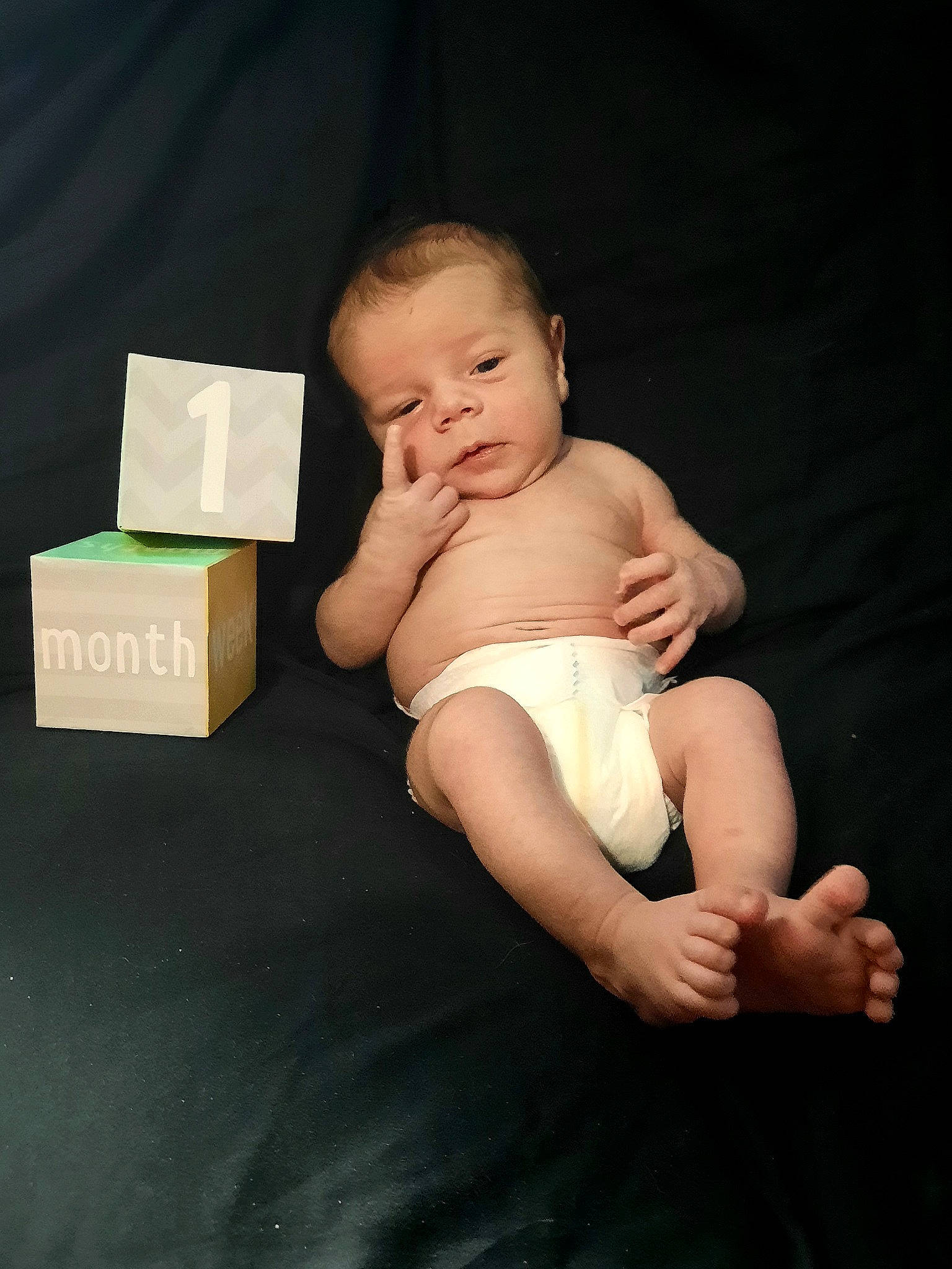 Lucian joined the competition — help win amazing prizes! baby, baby_toddler_clothing, barefoot, box, chest, child, comfort, elbow, finger, flash_photography, foot, human_leg, knee, person, shipping_box, sitting, stomach, thigh, toddler, trunk