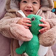 Elijah joined the competition — help win amazing prizes! baby, blanket, bodypart, clothing, coat, face, finger, hand, happy, hat, head, hood, jacket, knitwear, person, photography, portrait, smile, sweater, toy