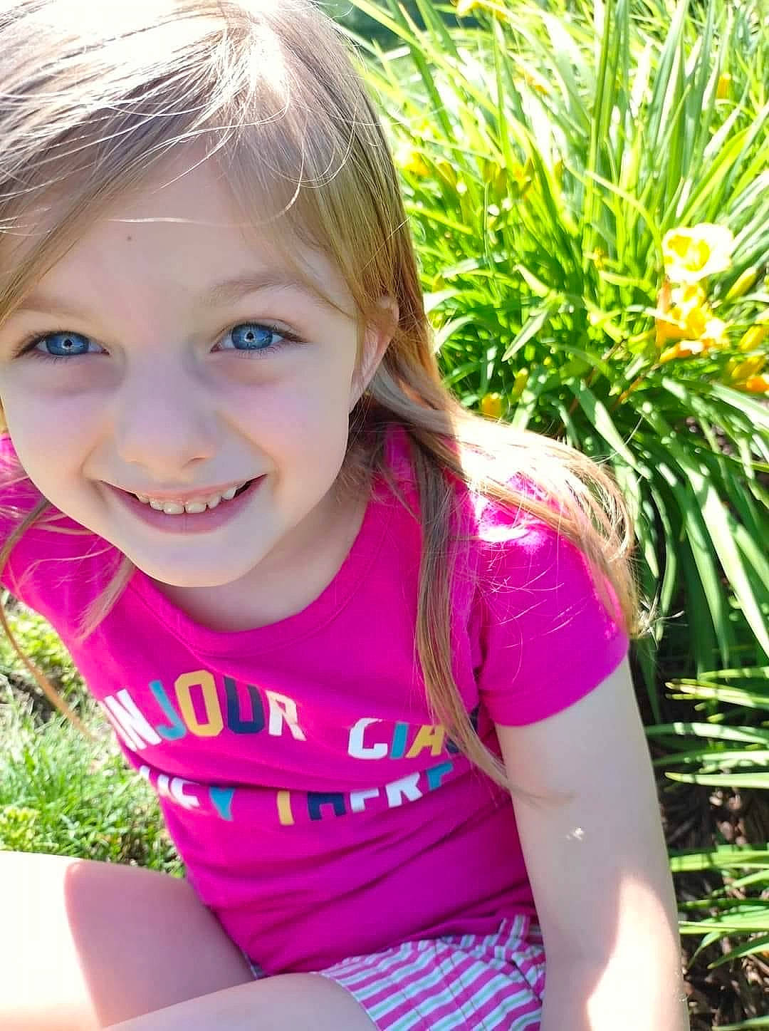 Tessa joined the competition — help win amazing prizes! beauty, blond, botany, child, fun, grass, green, happy, joy, leisure, light, lip, magenta, people_in_nature, person, pink, plant, skin, smile, thigh