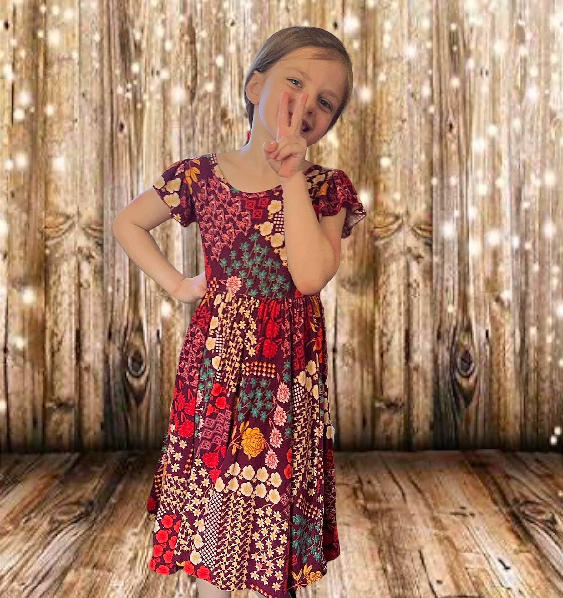 Tessa is registered to the contest to win money with this photo: child, clothing, day_dress, dress, event, face, fashion_design, flash_photography, flooring, formal_wear, happy, long_hair, neck, one_piece_garment, pattern, person, sleeve, standing, street_fashion, waist